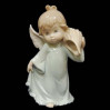 Figurka porcelanowy aniołek z muszelką 325-3006