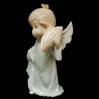 Figurka porcelanowy aniołek z muszelką 325-3006
