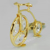 Złota figurka bicykl z kryształkami swarovskiego 122-0073