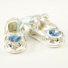 Srebrna figurka buciki z niebieskimi kryształkami swarovskiego 122-0310