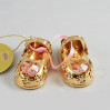 Złota figurka buciki z różowymi kryształkami swarovskiego 122-0040