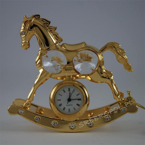Złota figurka konik na biegunach z zegarkiem z kryształkami swarovskiego