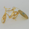 Złota figurka rowerek z kryształkami swarovskiego 122-0102