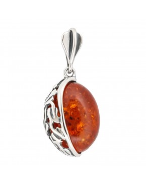 srebrny wisiorek z koniakowym bursztynem w ażurowej oprawie