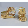 Złota figurka buciki z niebieską wstążeczką i kryształkami swarovskiego 122-0217